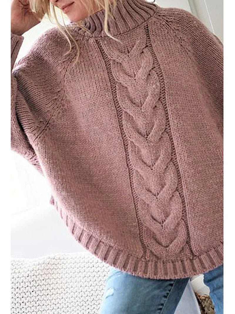 Woman wearing a cozy mauve cable knit turtleneck sweater with ribbed hem and cuffs