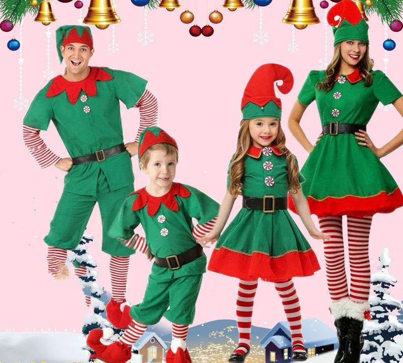 Family of four in festive Christmas elf costumes with green outfits, red collars, striped tights, and elf hats