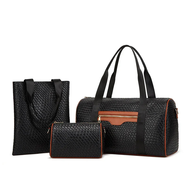 Set of three black textured bags including a tote, a duffle with brown accents, and a small pouch