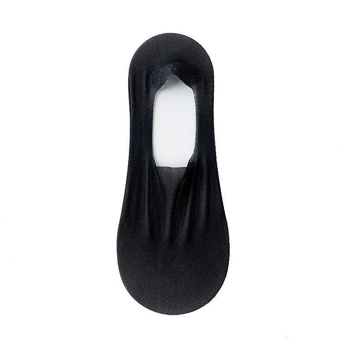 black no-show liner sock made of thin breathable fabric on white background