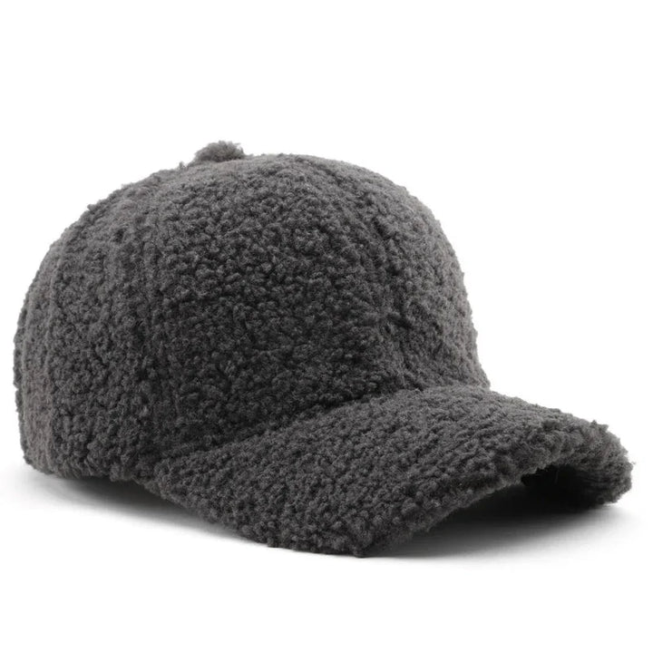 Dark gray fuzzy fleece baseball cap with curved brim against white background
