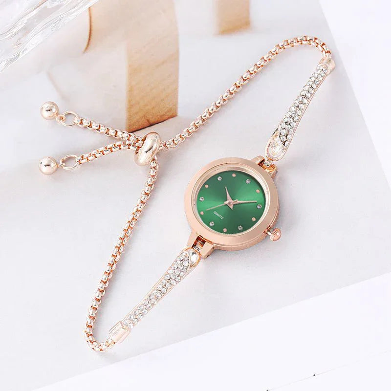 Rose gold women's wristwatch with green dial and crystal-studded adjustable bracelet