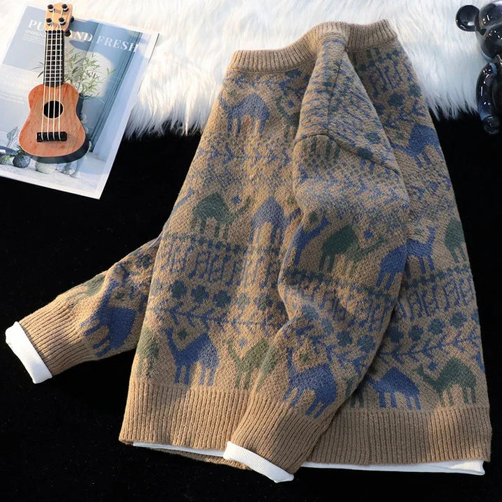 Cozy brown knit sweater with blue and green animal patterns and foliage design on white fur