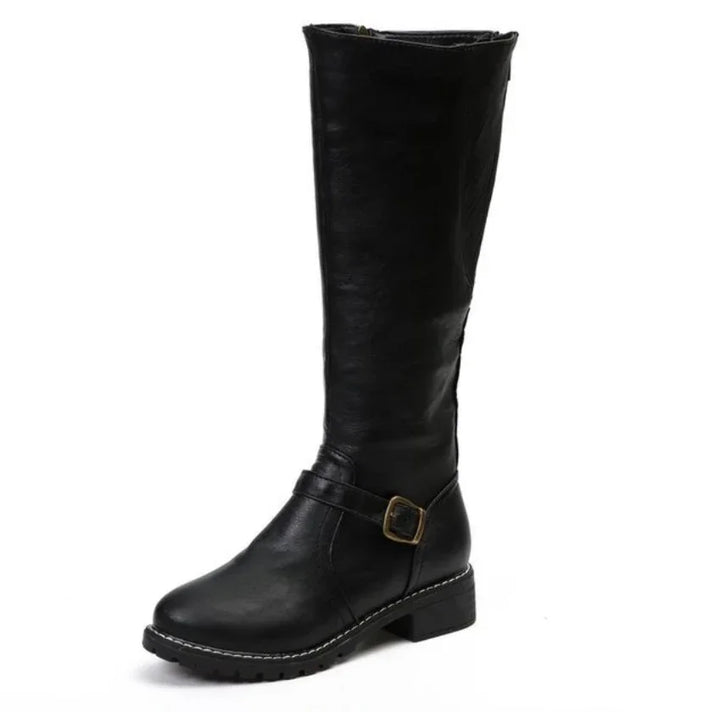 Black knee-high leather boot with side buckle and rugged sole on white background