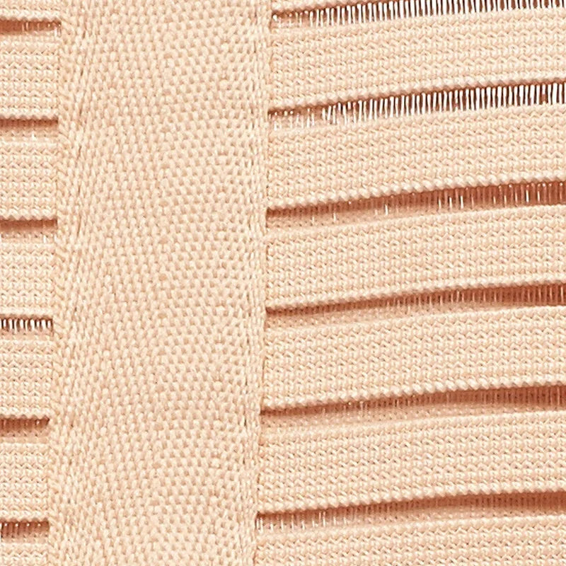 Close-up of beige knit fabric with horizontal slits and woven texture