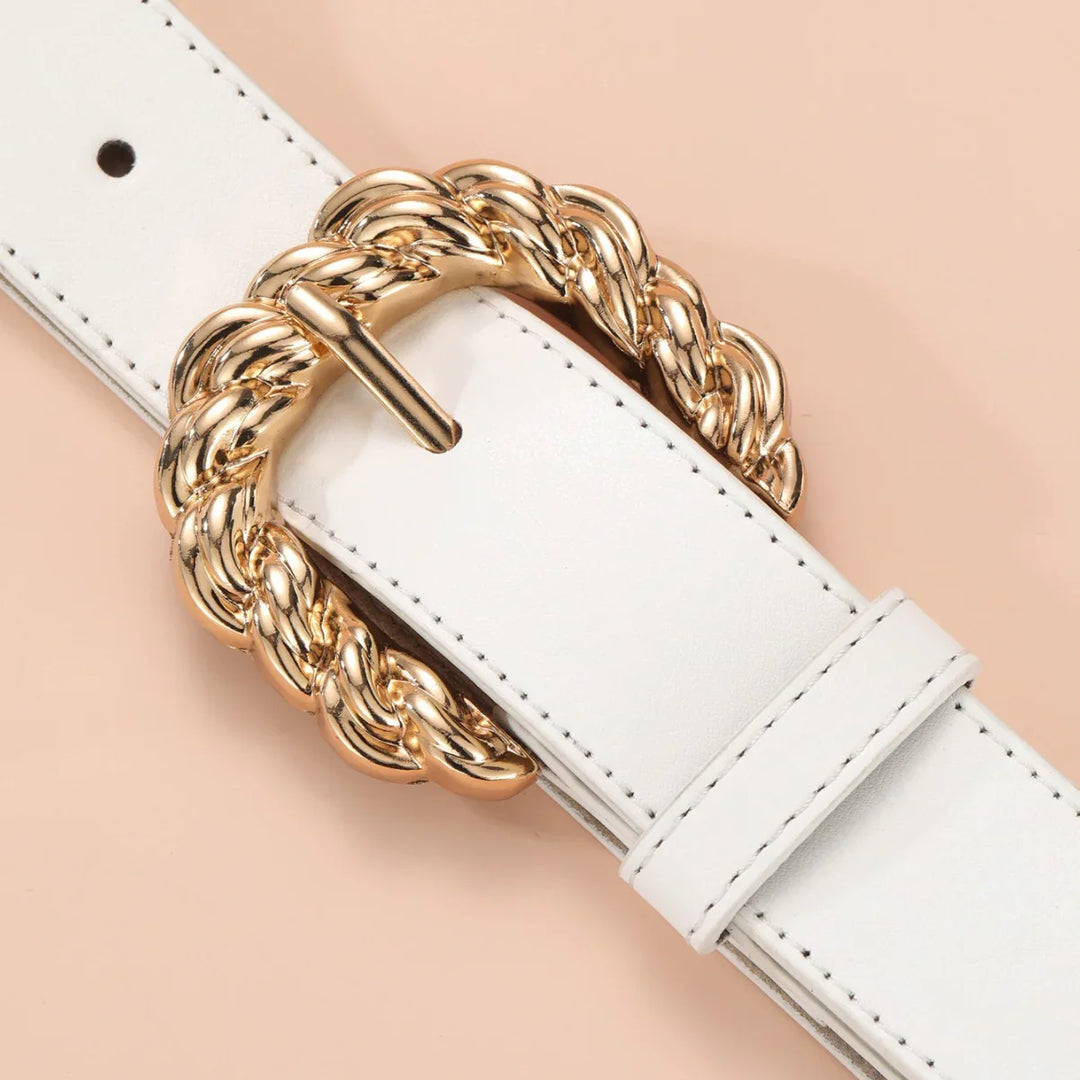 White leather belt with braided gold metal buckle on beige background