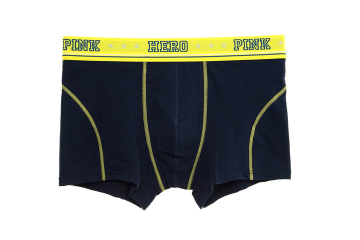 Navy blue men's boxer briefs with yellow waistband featuring PINK HERO PINK text and yellow stitching