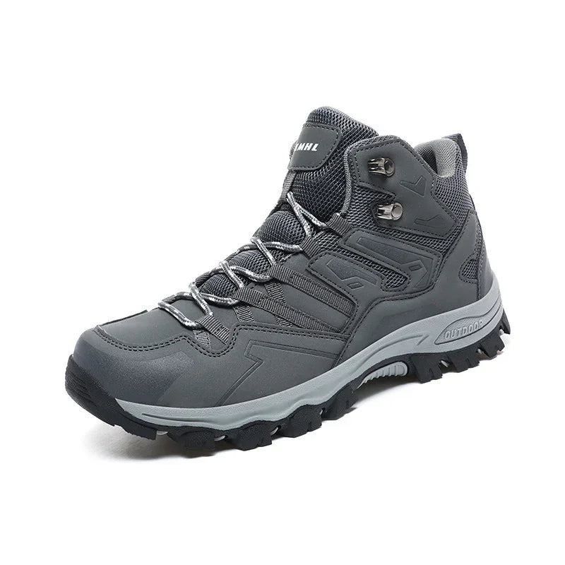 Gray and black outdoor hiking boot with sturdy sole and mesh upper