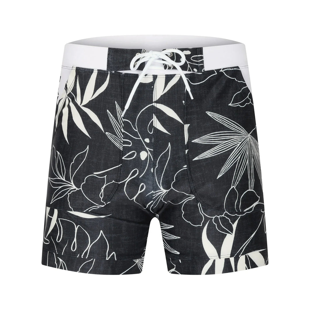 Black and white floral print men's swim trunks with white drawstring and high waistband