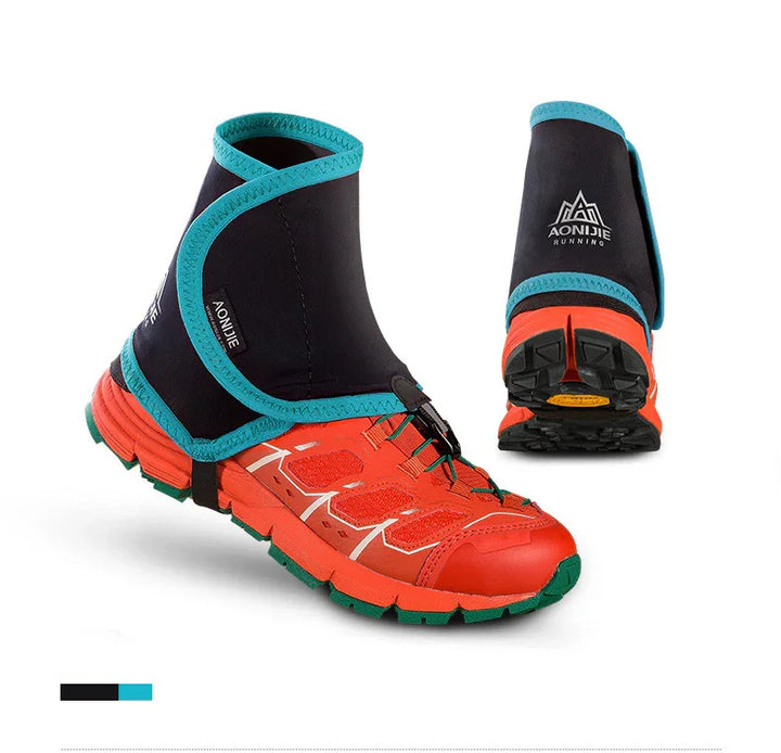 Red trail running shoes with black and turquoise Aonijie gaiters on white background