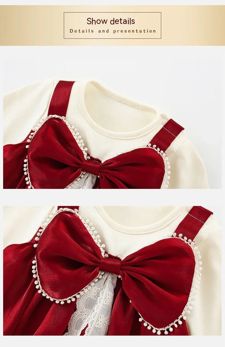 Close-up of cream-colored fabric with large red satin bow and white lace detailing