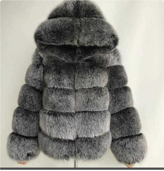 luxurious gray faux fur jacket with a hood and puffy sleeves on white background