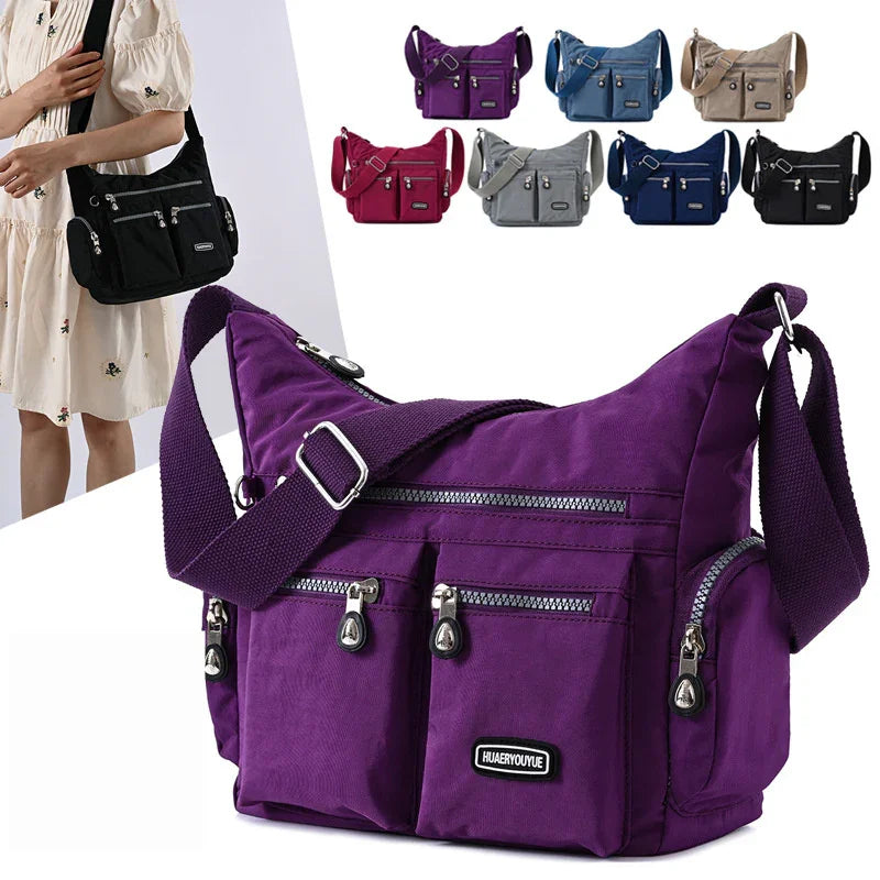 Purple crossbody shoulder bag with multiple zippered pockets and adjustable strap, shown in various colors