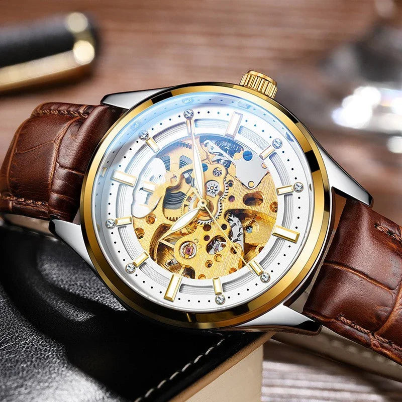 Luxury mechanical wristwatch with gold gears, silver and gold bezel, and brown leather strap