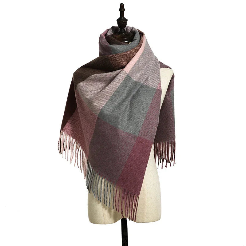 Soft wool scarf with large color blocks in pink, gray, and brown draped on dress form with fringed edges