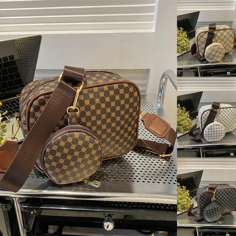 Brown designer crossbody bag with circular coin purse and adjustable strap on metal countertop