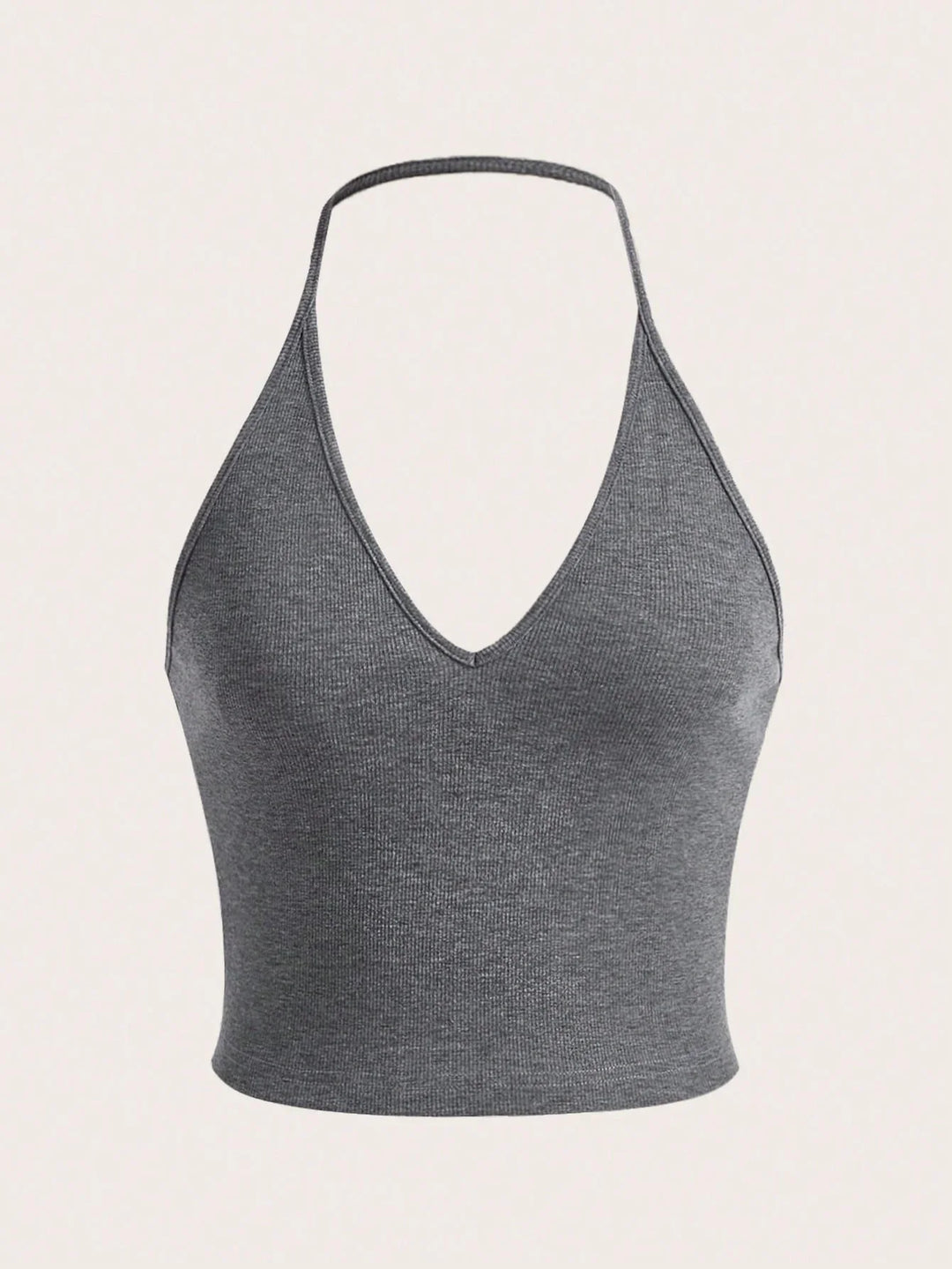 Grey ribbed halter neck crop top with deep V neckline on neutral background