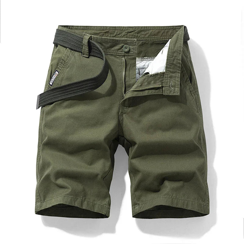 Men's olive green casual shorts with black belt and zipper fly on white background