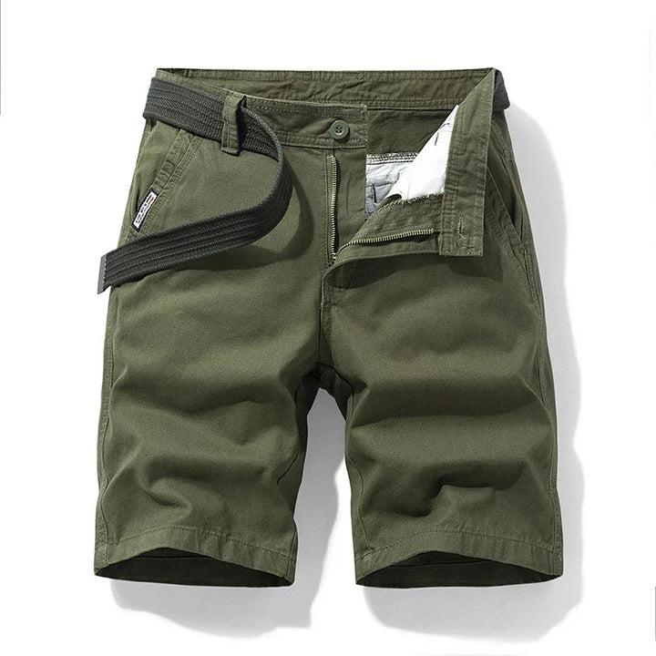 Men's olive green casual shorts with black belt and zipper fly on white background