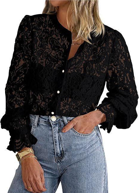 Woman wearing black lace button-up blouse with long puff sleeves paired with high-waisted blue jeans