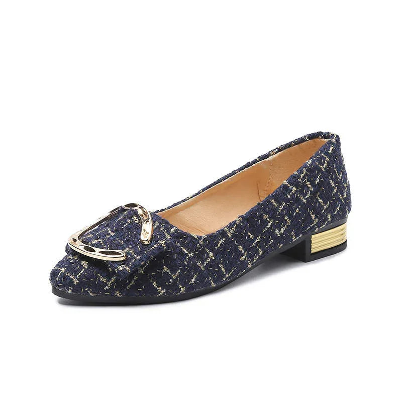 Navy blue tweed flat shoe with gold buckle detail and small stacked gold accented heel