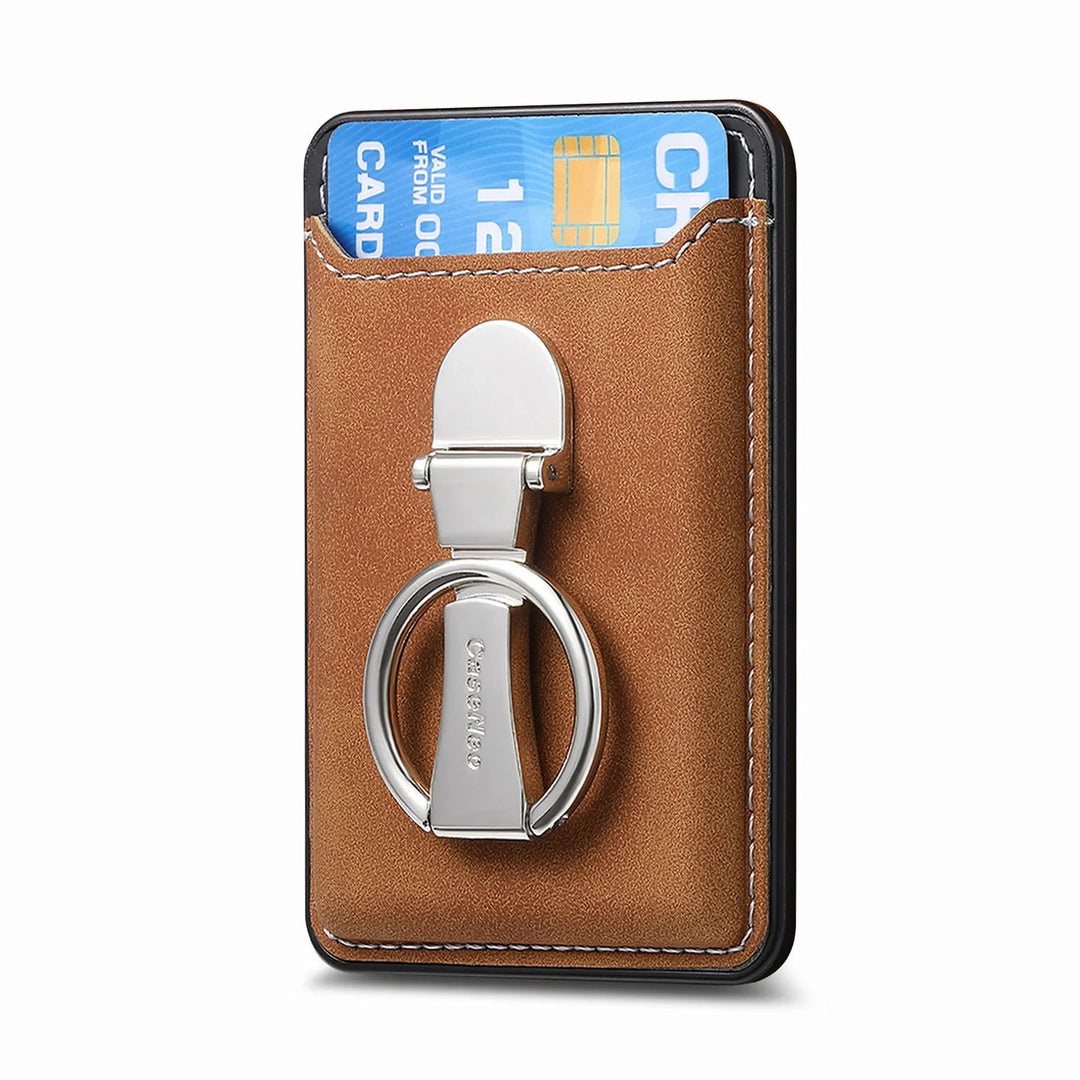 Brown leather card holder with silver ring stand and partially visible blue credit card