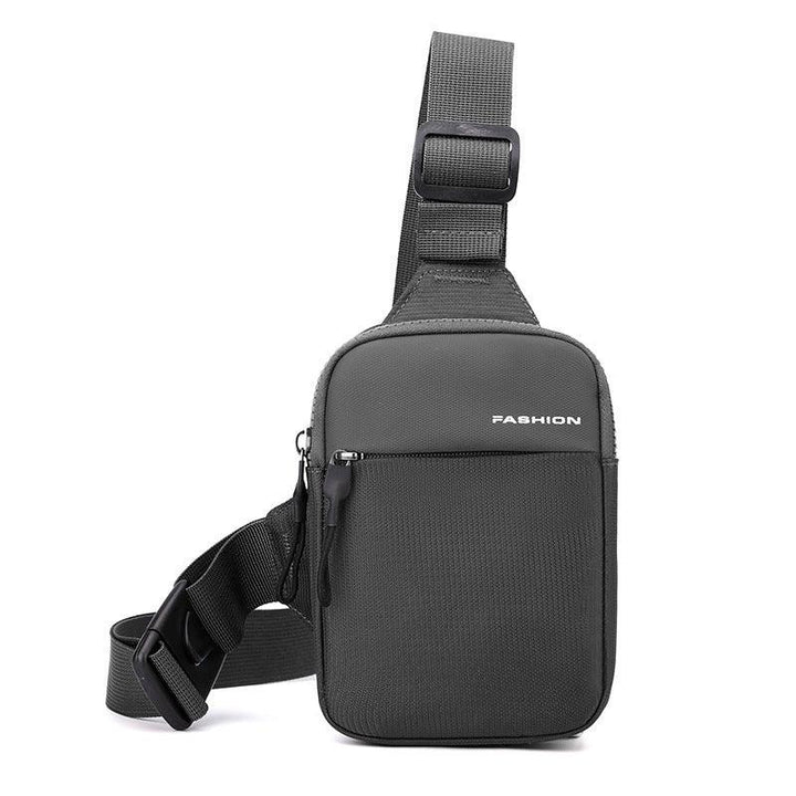 Compact black sling bag with adjustable strap and front zipper pocket, labeled 'Fashion'
