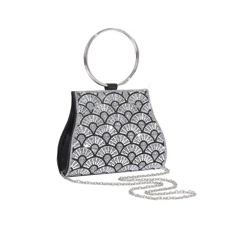 Black evening handbag with silver fan-shaped rhinestone embellishments and silver handle chain