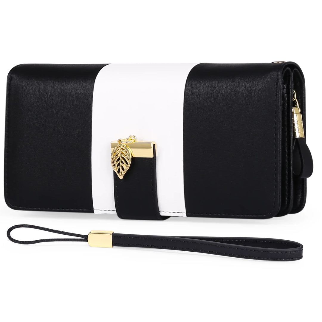Black and white leather wristlet wallet with gold leaf charm and detachable strap