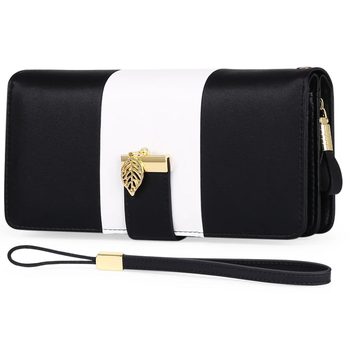 Black and white leather wristlet wallet with gold leaf charm and detachable strap
