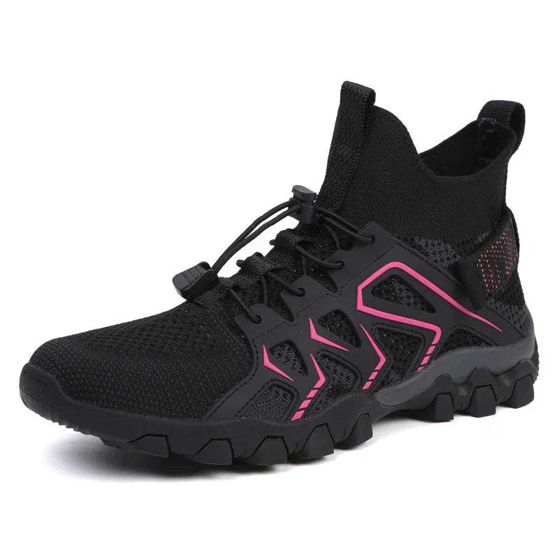 Black high-top athletic shoe with pink accents and rugged sole on white background