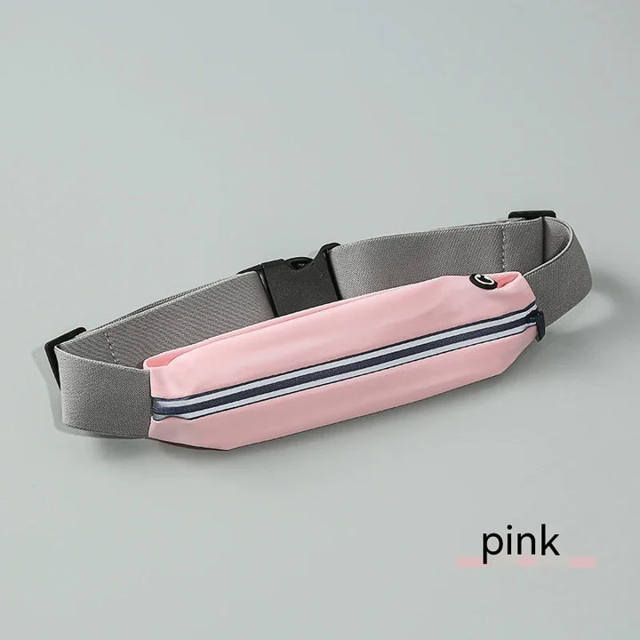 Pink running belt with grey adjustable strap and black buckle on a grey background