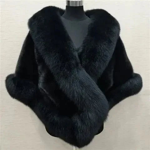 Luxurious black fur shawl with wide collar and trimmed edges displayed on mannequin