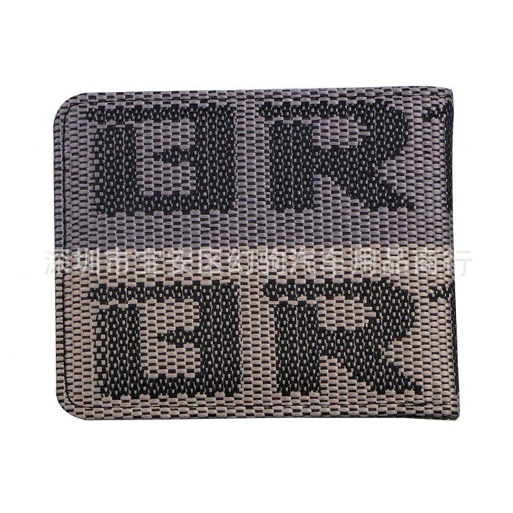Black and gray woven textile wallet featuring bold block letters 'ER' in a checkered pattern