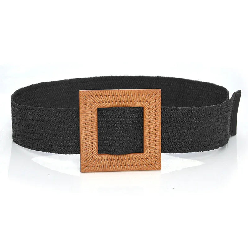 Black woven belt with a large square brown woven buckle on a white background
