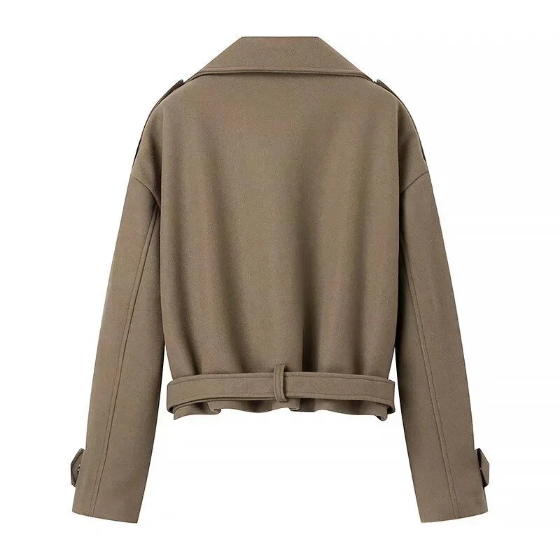 Back view of a cropped brown wool blend jacket with collar and belted waist