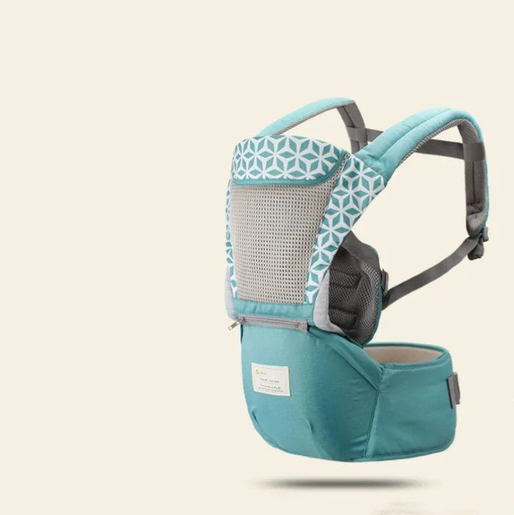 Teal baby carrier with geometric pattern and breathable mesh on beige background