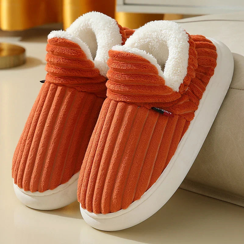 Orange ribbed design slip-on slippers with white plush fleece lining and white soles