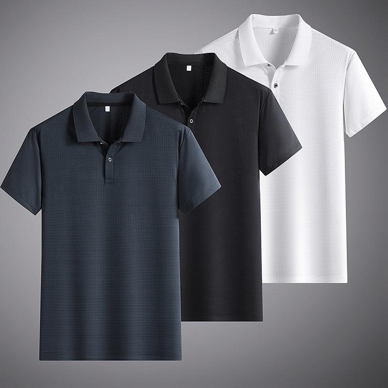 Three men's polo shirts in navy, black, and white with subtle textured pattern on gray background