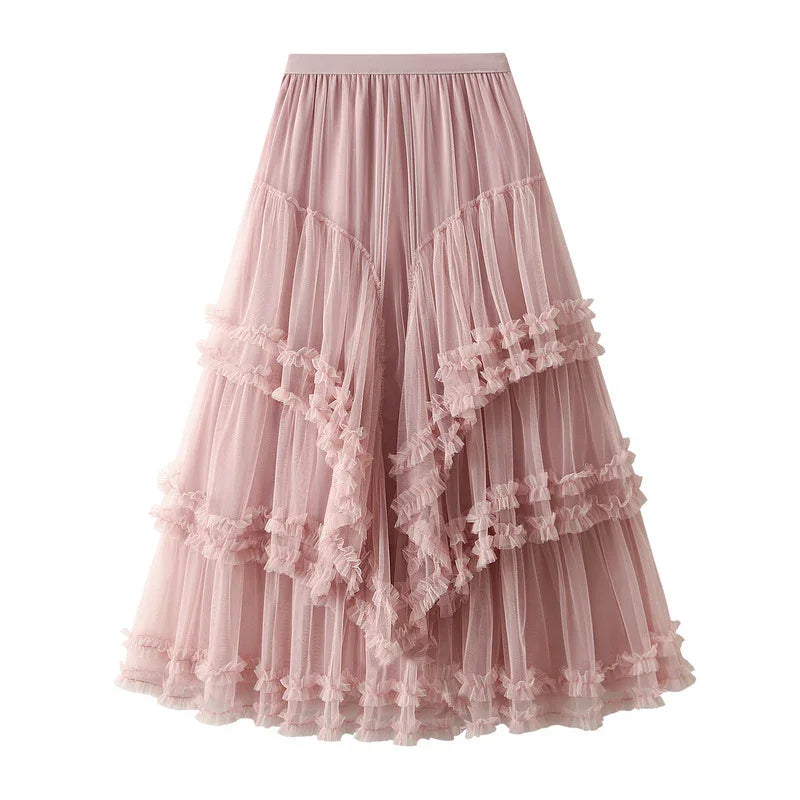 Pink layered tulle midi skirt with ruffle and bow details on white background