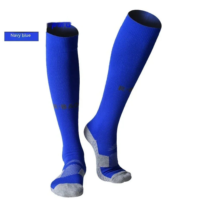 Navy blue knee-high athletic socks with gray reinforced toes and heels on white background