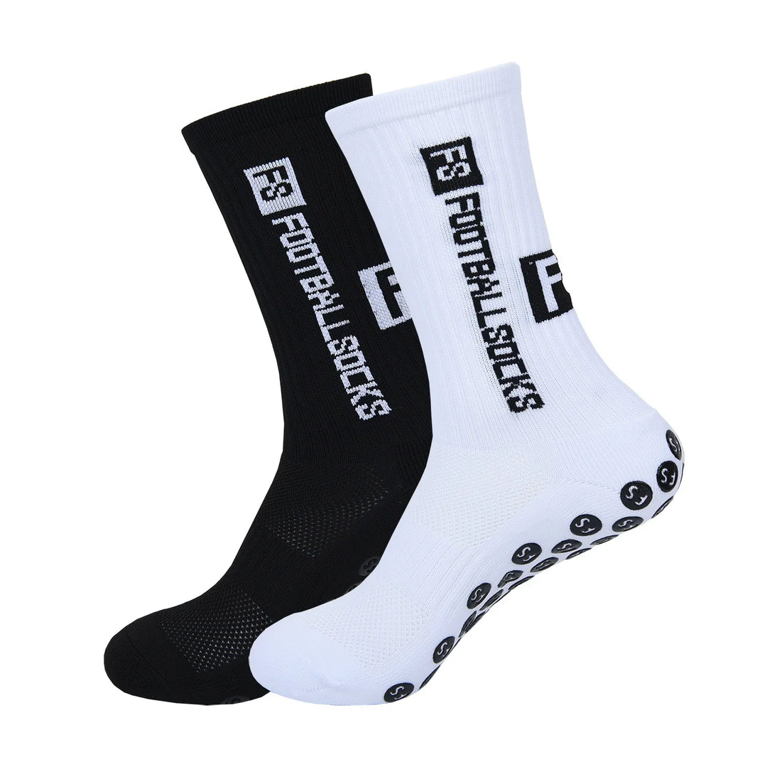 Black and white high-performance sports socks with F3 Footballstuds logo and grip soles