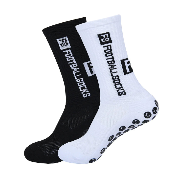 Black and white high-performance sports socks with F3 Footballstuds logo and grip soles