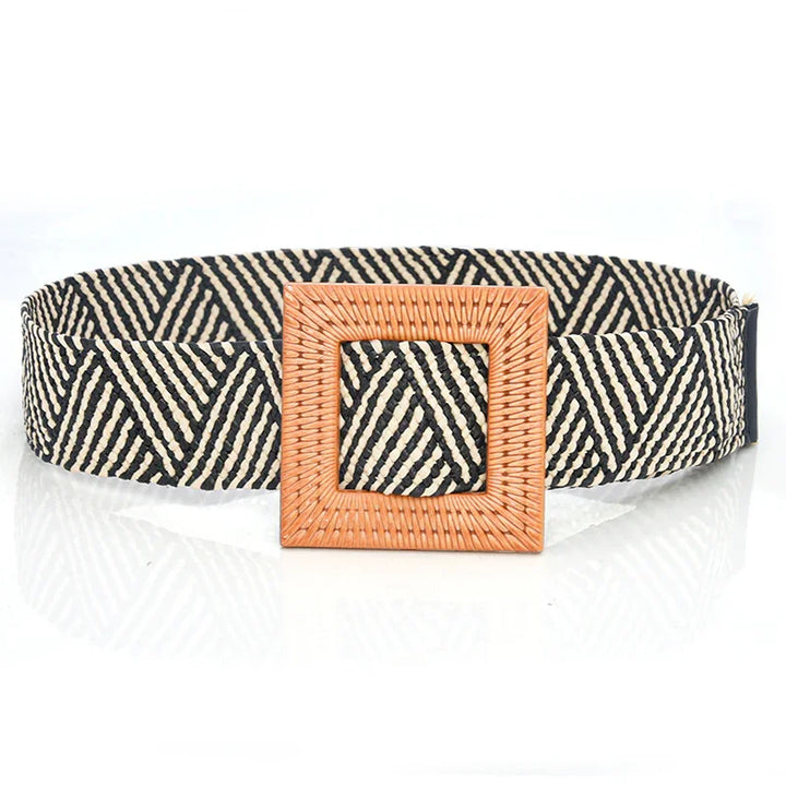 Black and beige woven belt with geometric pattern and square wooden buckle on white background