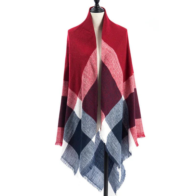red, pink, white, and blue plaid blanket scarf draped on mannequin