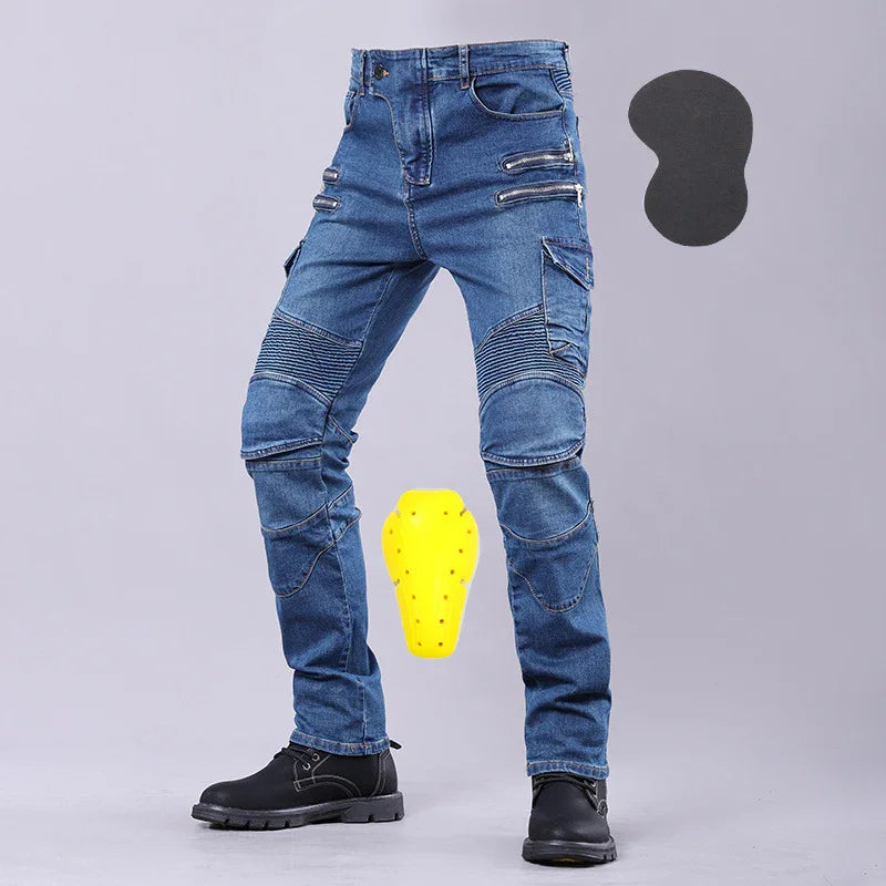 Men's blue motorcycle riding jeans with knee armor and black boots on gray background