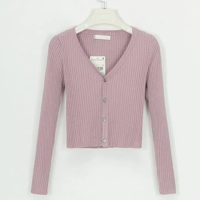Mauve ribbed knit cropped cardigan with long sleeves and front buttons on white hanger