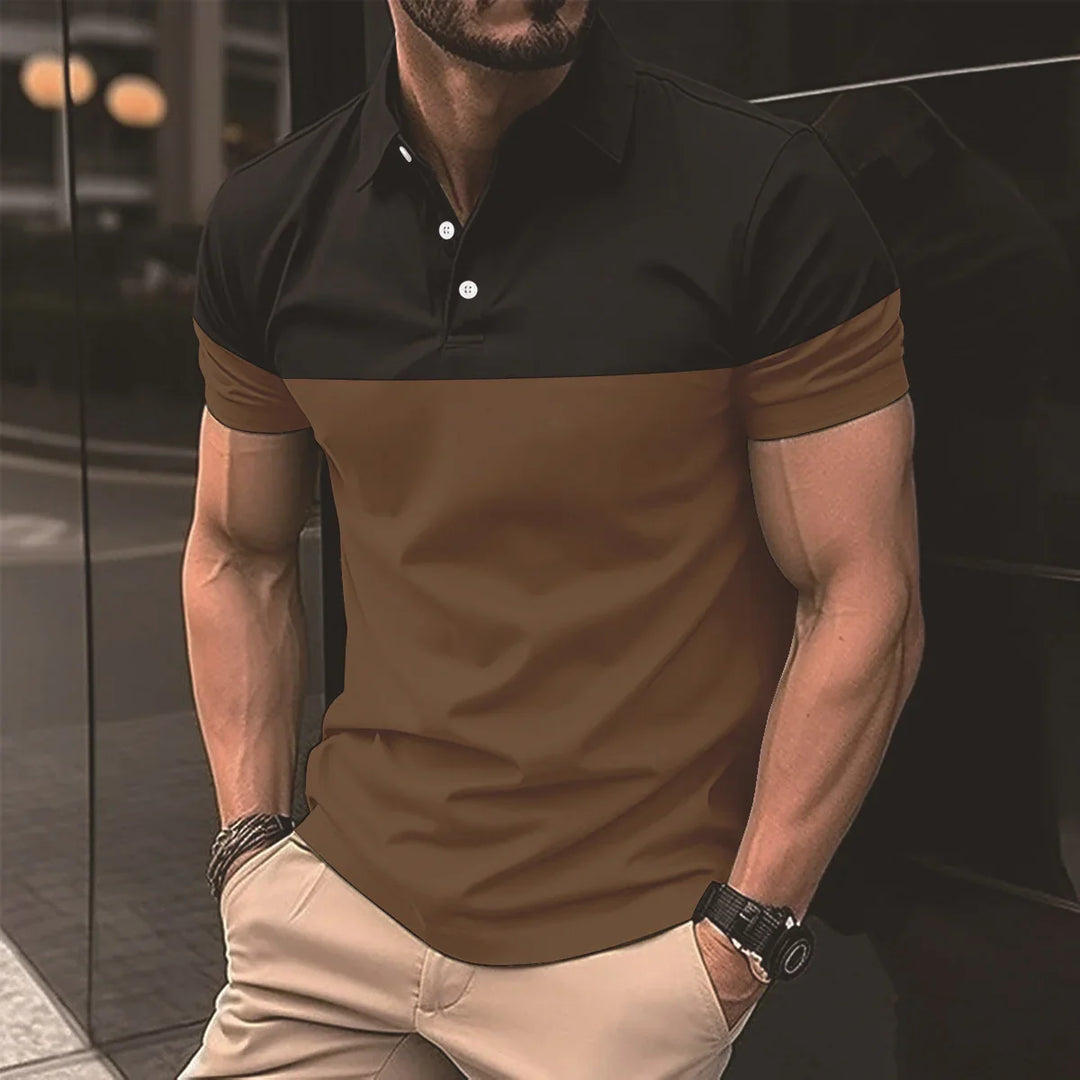Man wearing a black and brown short-sleeve polo shirt with beige pants, black watch, and bracelets