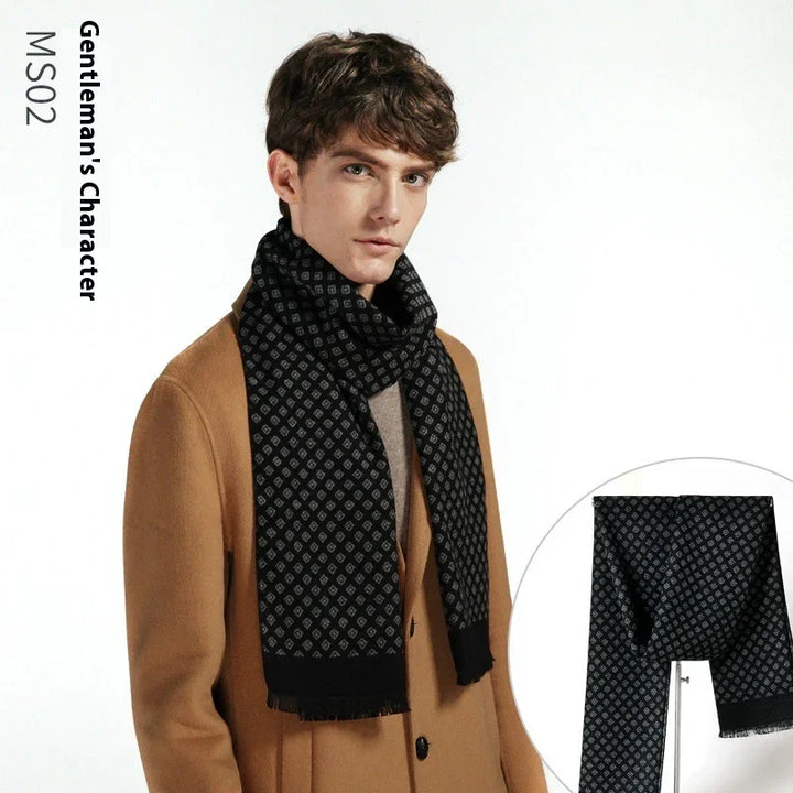Elegant young man wearing camel coat and black patterned scarf in minimalist studio