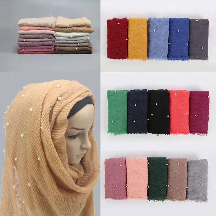 Pearl embellished textured fabric scarves in various colors displayed, beige scarf on mannequin head